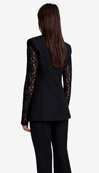 Black suit with lace sleeves on a white background