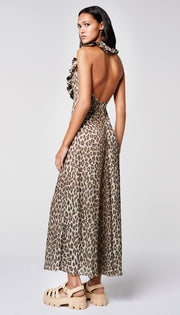 A woman in a leopard print dress