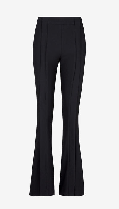 Black flared pants on a light gray background