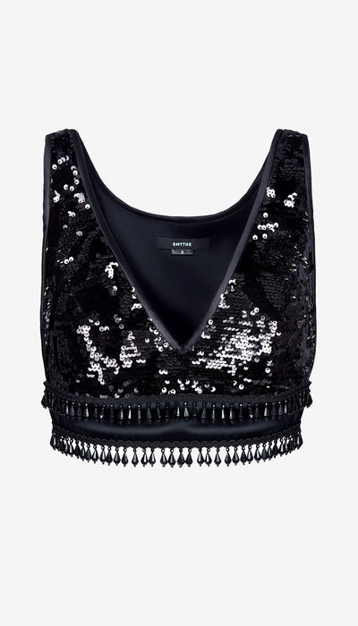 Black sequin crop top with fringe on a white background