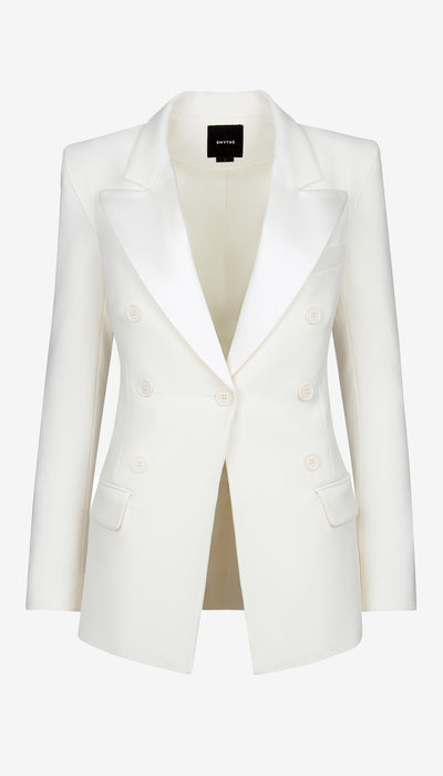 White blazer on a white background with a visible brand label.