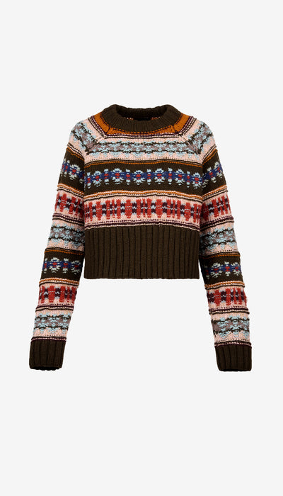 Multicolored patterned sweater on a white background