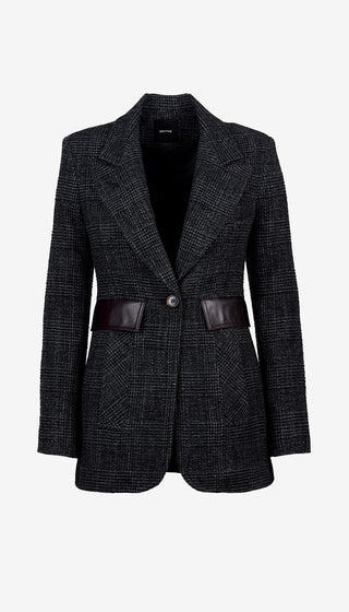 Houndstooth pattern blazer with leather accents on a light gray background