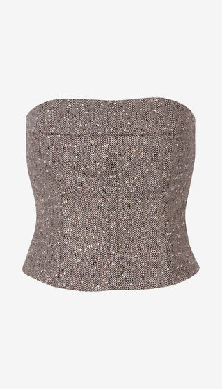 A strapless bandeau-style top with a structured, slightly tapered silhouette, featuring a textured tweed-like fabric with a fine houndstooth pattern in brown, beige, and white.