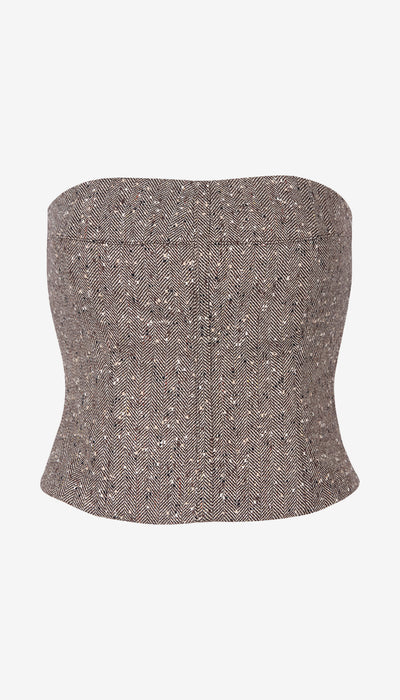 A strapless bandeau-style top with a structured, slightly tapered silhouette, featuring a textured tweed-like fabric with a fine houndstooth pattern in brown, beige, and white.