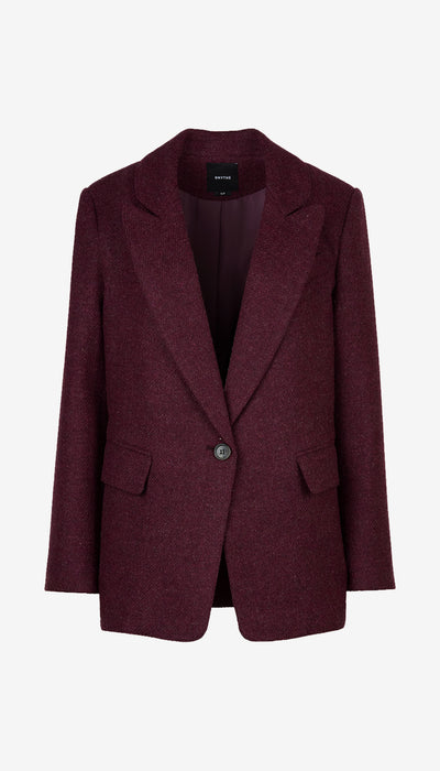 A single-breasted blazer in a heathered burgundy fabric, featuring notched lapels, flap pockets, and a single button closure, shown against a plain light gray background.