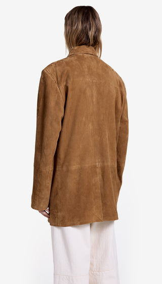 Brown suede jacket worn by a person on a white background