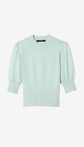 Light green sweater with puff sleeves on a white background