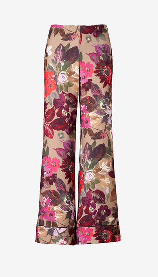 Floral patterned pants on a beige background