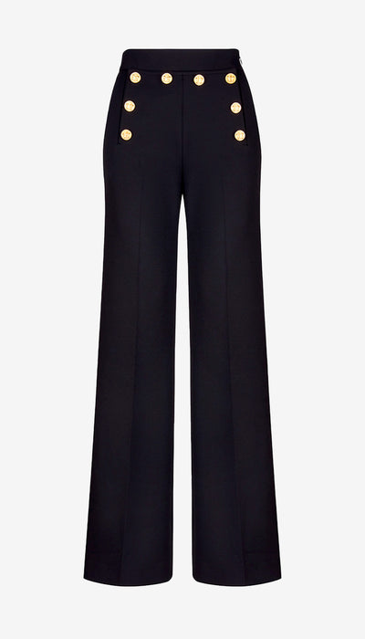 Black pants with gold buttons on a white background