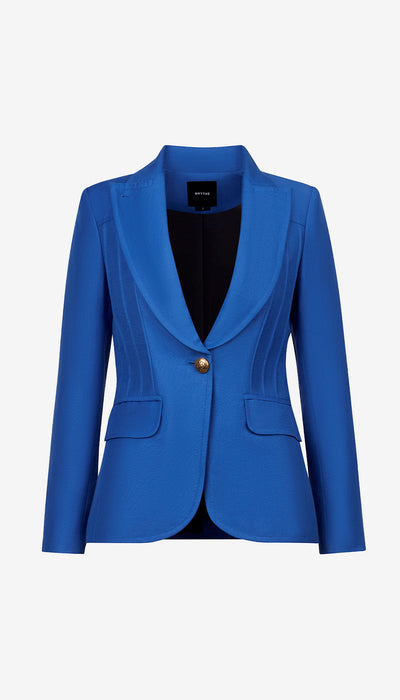 Blue blazer with a gold button on a white background