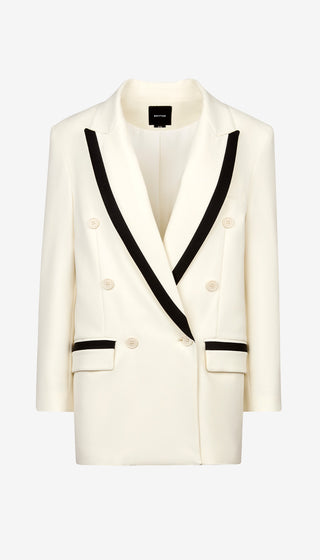 White blazer with black lapels on a white background