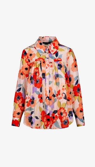 Floral patterned blouse on a white background