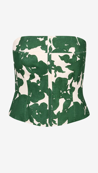 Green and white floral patterned top on a white background