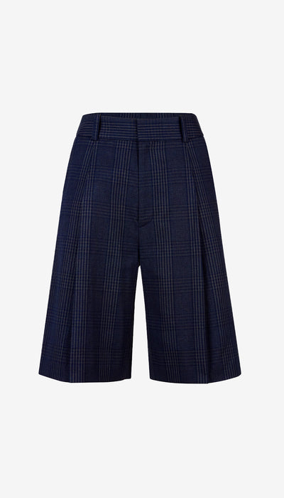Navy checkered shorts on a light gray background