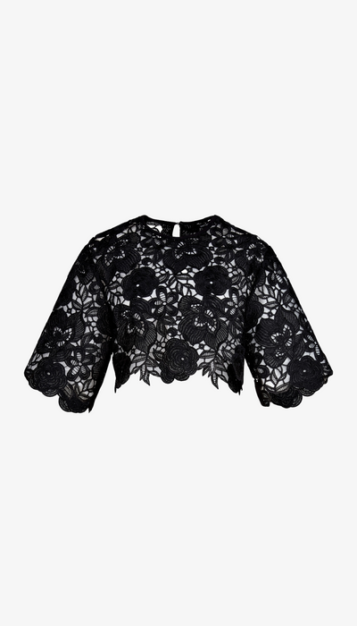 Black lace top on a white background