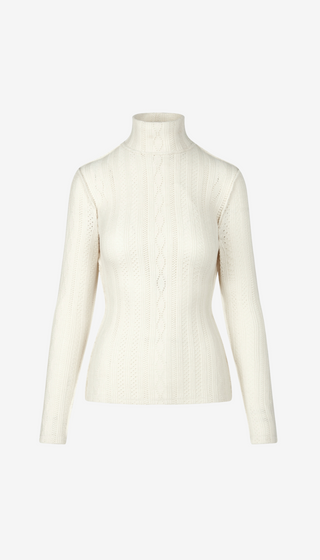 White turtleneck sweater on a mannequin against a white background