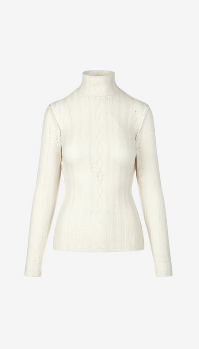 White turtleneck sweater on a mannequin against a white background