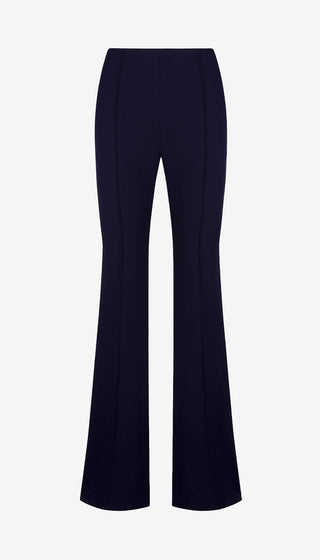 Navy blue flared pants on a light gray background