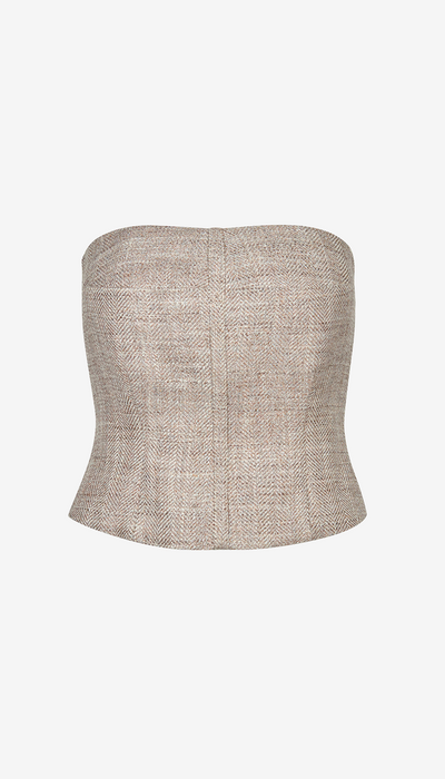 Textured strapless top on a white background